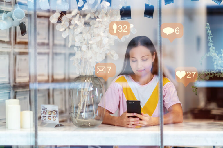 A business owner receives the benefit of regular posting with a Cdesigns Marketing social media package
