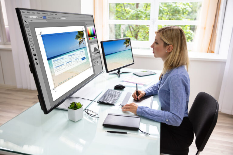 A graphic designer works on a site as part of a website design package at Cdesigns Marketing.